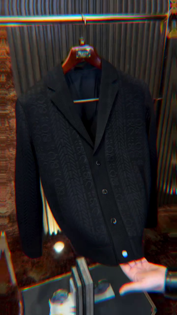 Black single-breasted casual blazer with a textured pattern